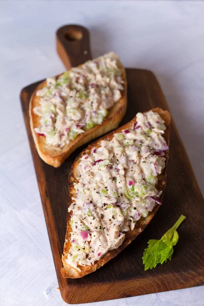 Tuna salad sandwiches on serving board. Healthy nutrition food