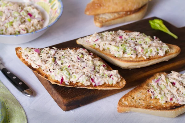 Tuna salad sandwiches on serving board. Healthy nutrition food