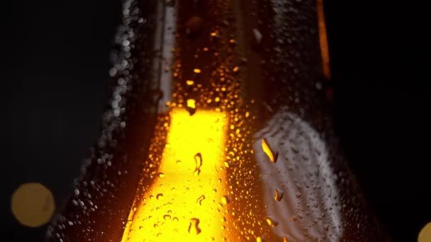 Cold Misted Bottle Beer Covered Drops Macro Shot Black Background — Stock Video