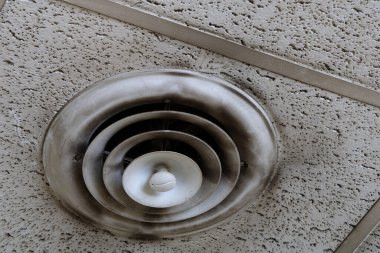 Extremely dirty heating and air conditioning vent in need of maintenance clipart