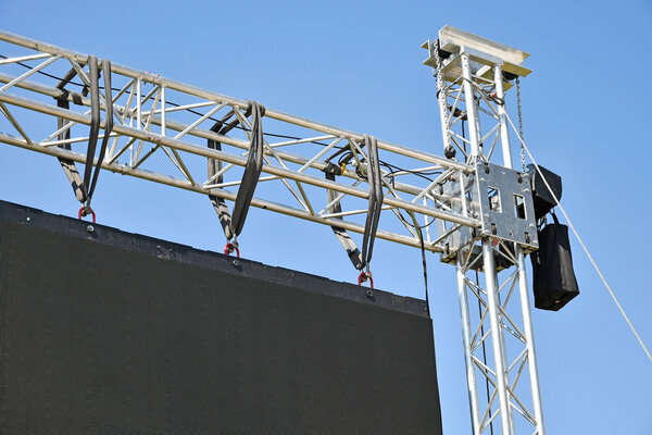 Baluster of a large LED screen outdoors against sk
