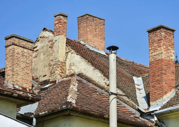 Smoke stacks on the roof — Stock Photo, Image