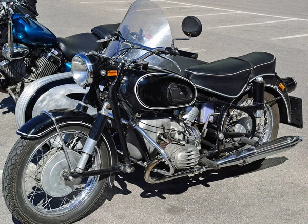 Old motorcycle at the parking lot — Stock Photo, Image