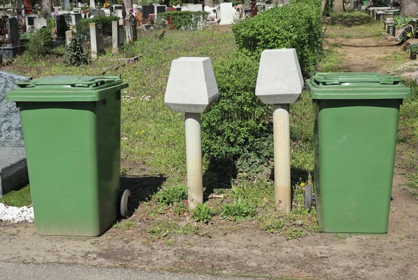 Garbage cans in the public cemetery