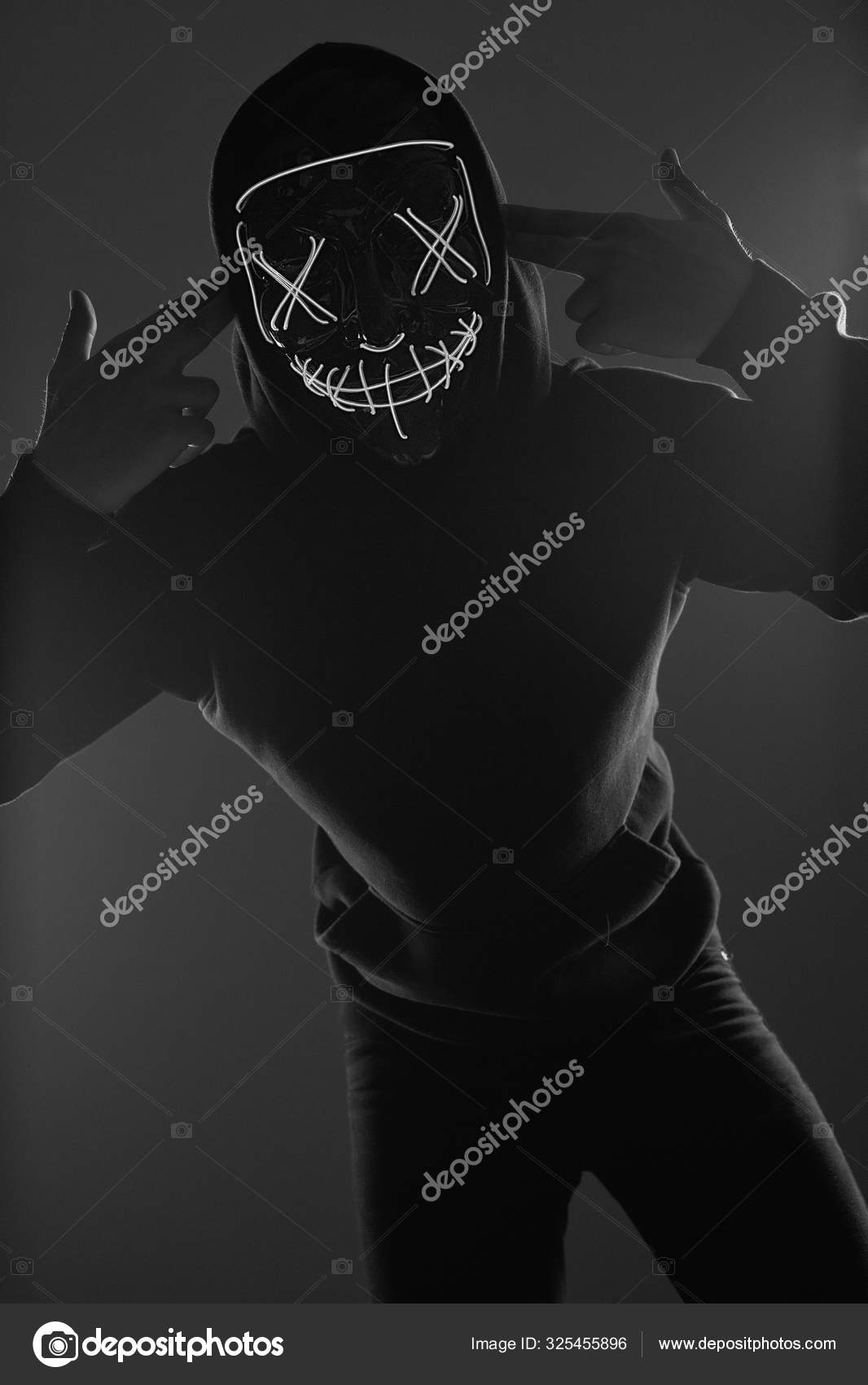 scary man in black hoodie