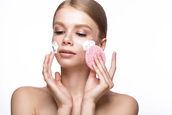 Beautiful young girl with sponge and foam cleanser, French manicure. Beauty face. — Stock Photo, Image