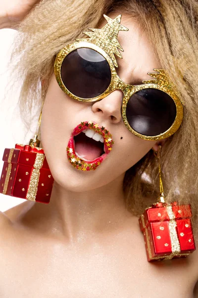 Jolly cheerful beautiful girl in New Years image with festive make-up. smile beauty face. — Stock Photo, Image