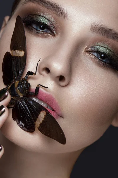 Portrait of beautiful girl with colorful make-up and cicada. Beauty face. — Stock Photo, Image