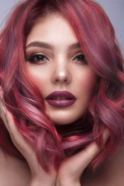 Beautiful girl with multi-colored hair and classic make-up and hairstyle. Beauty face. — Stock Photo, Image