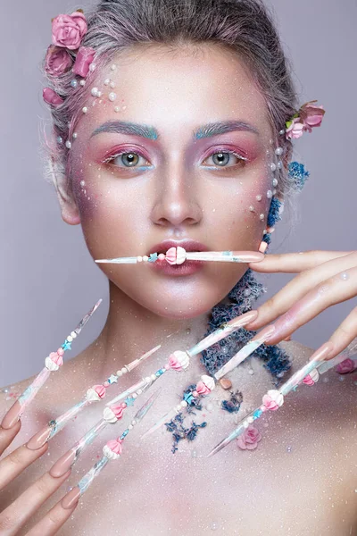 Beautiful girl in the image of a sweet fairy with art make-up and with long design nails. Creative manicure. — Stock Photo, Image