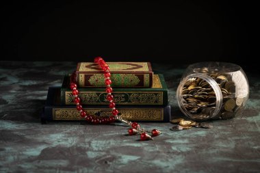 Zeka kavramı: Kuran ve bir kavanoz dolusu bozuk para.