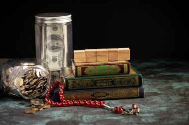 Zeka kavramı: Kuran ve bir kavanoz dolusu bozuk para.