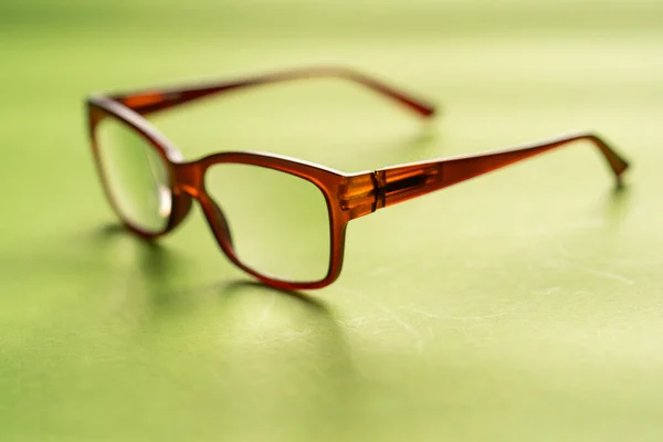 Brýlové Nebo Oční Sklo Izolované Proti Zelené — Stock fotografie