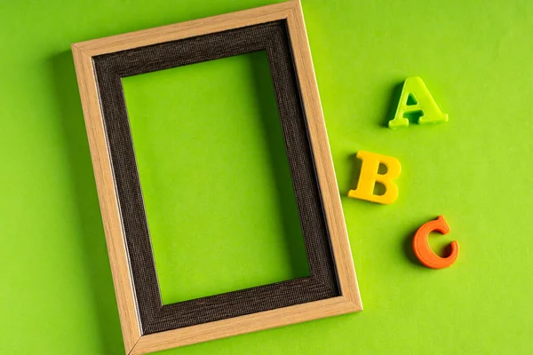 Abc Empty Photo Frame Green Background — Stock Photo, Image