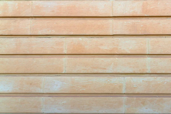 Jasnożółty kamień ściana tekstury tło poziome — Zdjęcie stockowe
