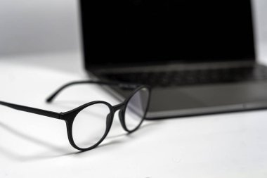 Computer screen Protection glasses closeup light background
