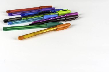 Set of colored pens isolted white background.