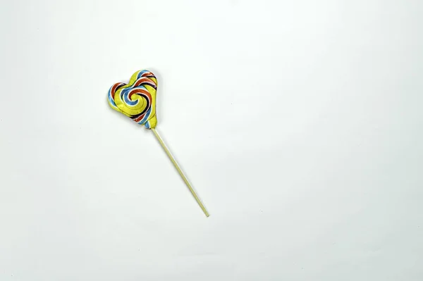 Rainbow color lollipops. colorful lollipop isolated on white background. Close up copy space. — Stock Photo, Image