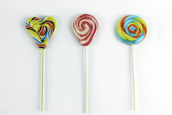 Rainbow color lollipops. colorful lollipop isolated on white background. Close up copy space. — Stock Photo, Image