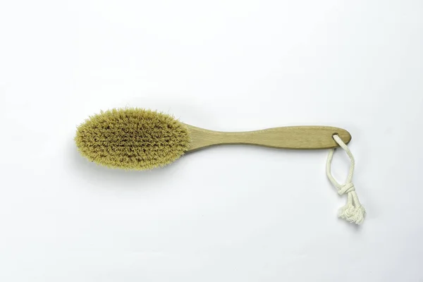 Wooden brush for body dry massage. dry wooden cellulite brush for body and foot massage.on white background. — Stock Photo, Image