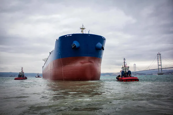 launching of renovated tanker cargo ship from dock to water