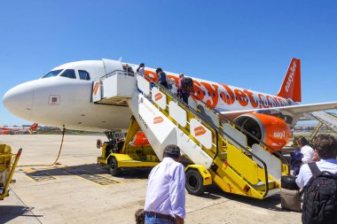 Passengers boarding an EasyJet flight at Lisbon airport. Lisbon, Portugal, June 2019