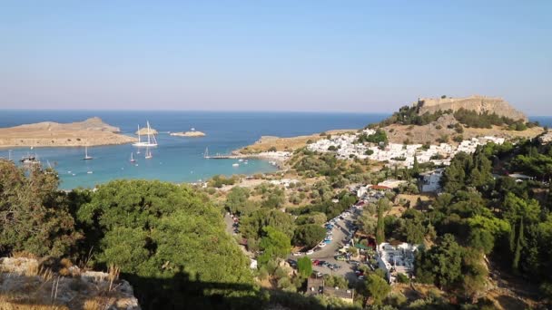 Rhodes Lindos, ancienne Acropole, Baie avec bateaux, Mer Méditerranée, Grèce .