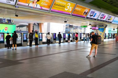 BTS Skytrain Bangkok passengers are waiting for the train. Thailand Bangkok March 2020 clipart
