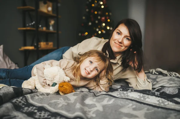 Mother and child having fun in Christmas time. — Stock Photo, Image