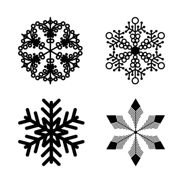 白い背景に4つの美しい対称黒の雪片のセット — ストックベクタ