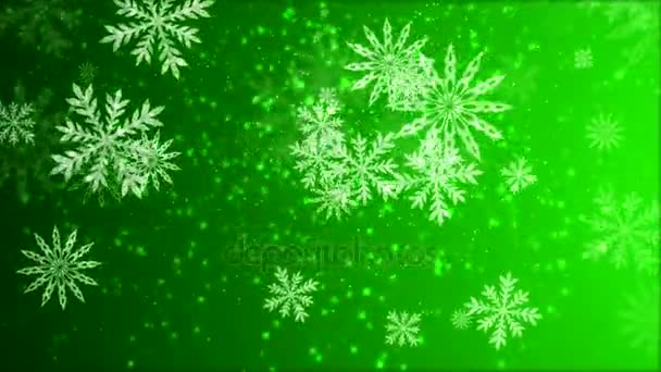 Vidéo-animation de flocons de neige tombant sur fond vert 