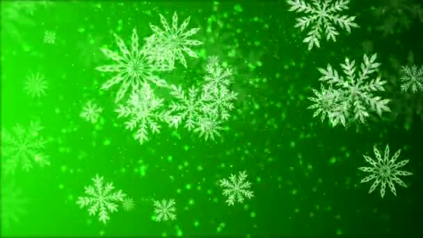 Vidéo-animation de flocons de neige tombant sur fond vert 