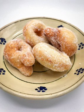 Zeppole, I 'deki karnavalı kutlamak için geleneksel kızarmış çörekler.