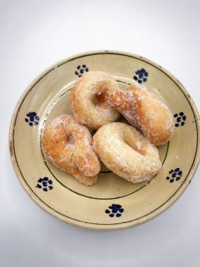 Zeppole, I 'deki karnavalı kutlamak için geleneksel kızarmış çörekler.