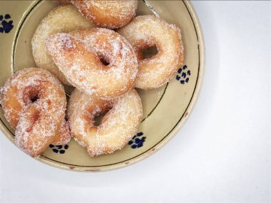 Zeppole, I 'deki karnavalı kutlamak için geleneksel kızarmış çörekler.