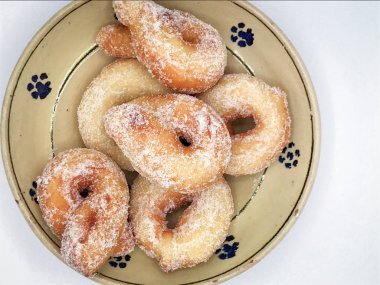 Zeppole, I 'deki karnavalı kutlamak için geleneksel kızarmış çörekler.