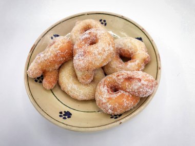 Zeppole, I 'deki karnavalı kutlamak için geleneksel kızarmış çörekler.