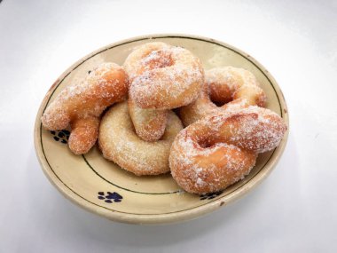 Zeppole, I 'deki karnavalı kutlamak için geleneksel kızarmış çörekler.