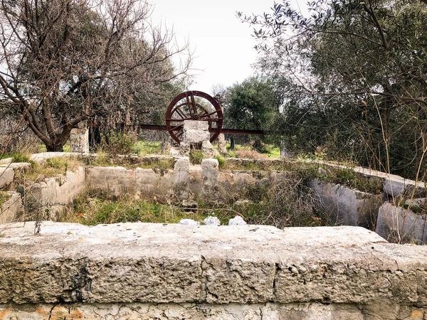 Noria, a ancient hydropowered mill used to lift water into a small aqueduct