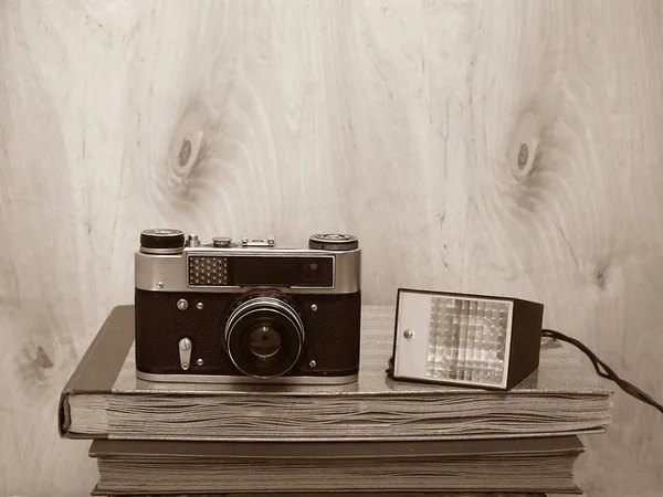 Old retro camera with flash, sepia — Stock Photo, Image
