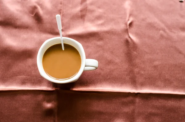 White coffee cup on background in the morning — Stock Photo, Image