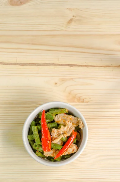 Spicy stir fried pork with red curry paste and Yard Long bean, T — Stock Photo, Image