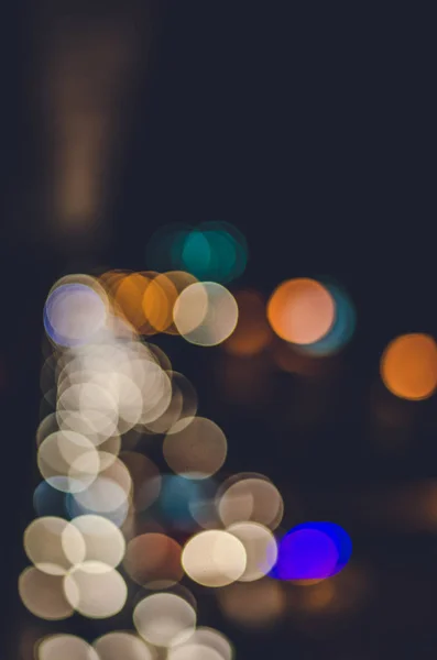 Stock image Abstract vintage image of bokeh lights in the city.