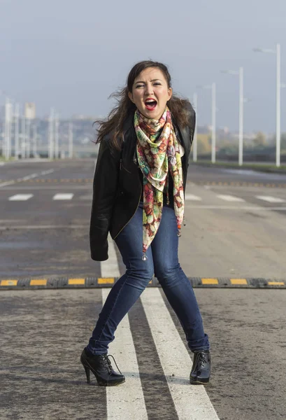 Beautiful girl in leather jacket — Stock Photo, Image