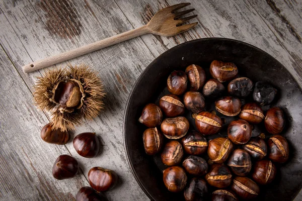 Roasted chestnuts cooked in a pot — Stock Photo, Image