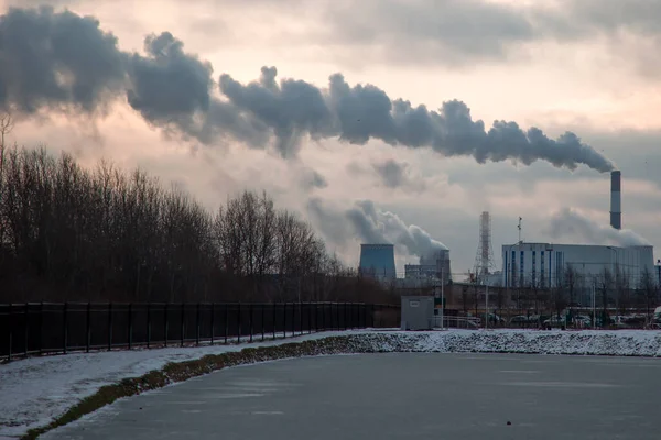 Sunrise over a power plant