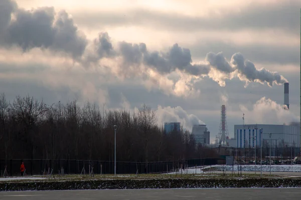 Sunrise over a power plant