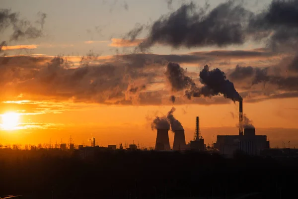 beautiful yellow sunset over the power station