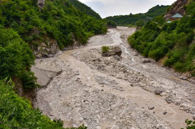 Mountain river on the way to the ancient center of handicraft production of copper utensils Lahich, Azerbaijan