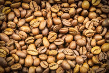 Arka plan için yakın plan kahve çekirdekleri.